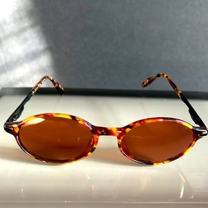 Serengeti Tortoise Shell Oval Sunglasses with Amber Lenses